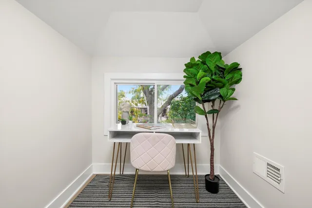 a vase of flowers sitting on a table