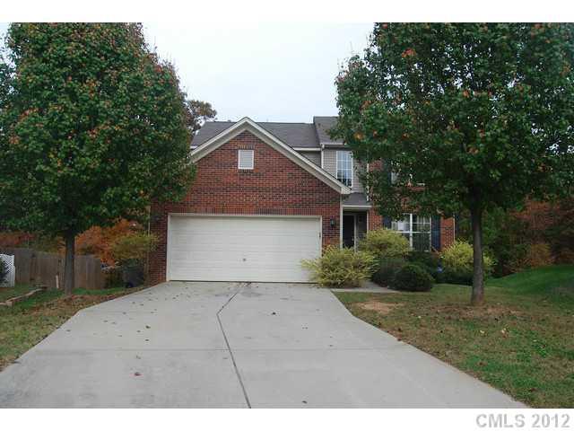 104 Austin Run Court Kannapolis, NC 28083 - Photo 1 of 16 a front view of a house with a yard