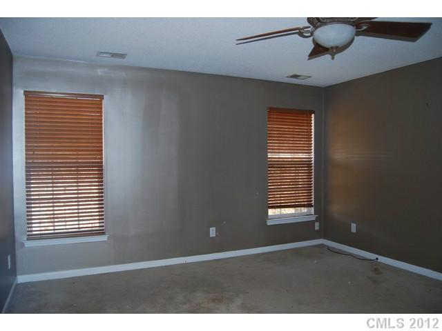 104 Austin Run Court Kannapolis, NC 28083 - Photo 9 of 16 a view of an empty room with a window