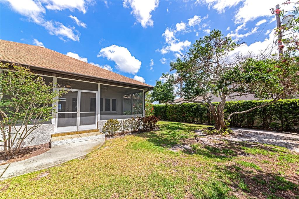 2305 Riverview Boulevard Bradenton, FL 34205 - Photo 50 of 71 a view of a house with a yard
