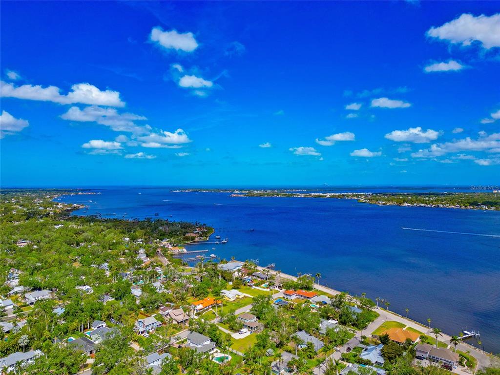 2305 Riverview Boulevard Bradenton, FL 34205 - Photo 69 of 71 a view of a lake and sunset