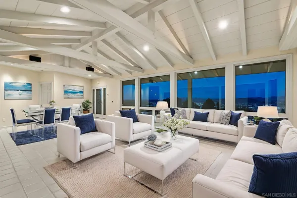 a view of an empty room with a kitchen