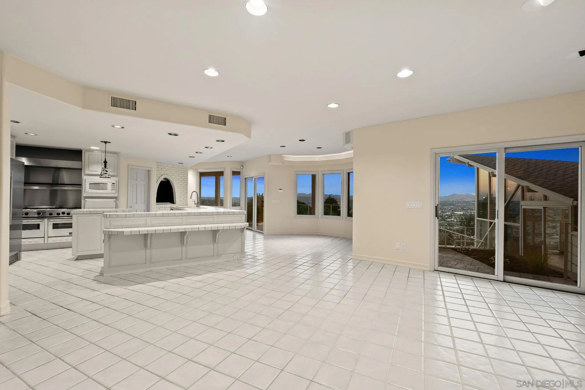 10595 Russell Road La Mesa, CA 91941 - Photo 14 of 40 a living room with furniture and a flat screen tv