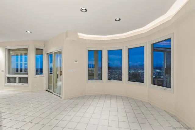 a bathroom with a shower and a sink