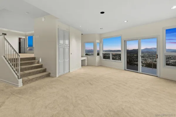 a bathroom with a bathtub shower sink vanity and toilet