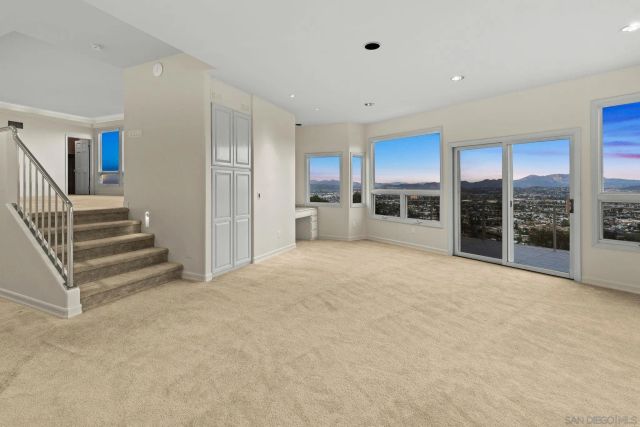 a bathroom with a bathtub shower sink vanity and toilet