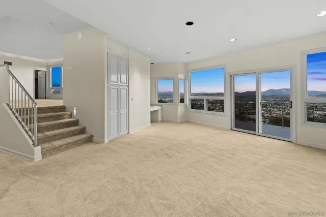 a bathroom with a bathtub shower sink vanity and toilet