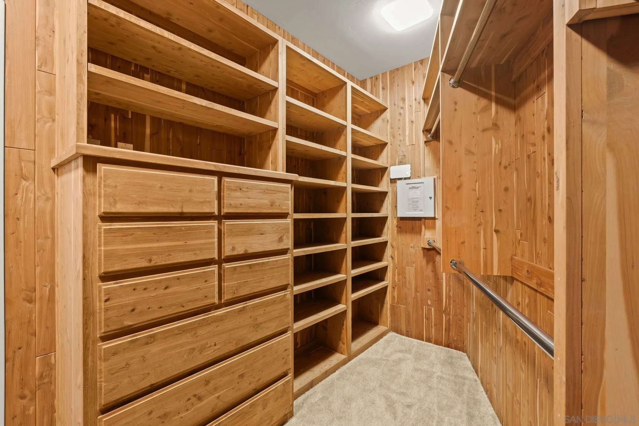 10595 Russell Road La Mesa, CA 91941 - Photo 31 of 40 a view of walk in closet with empty racks