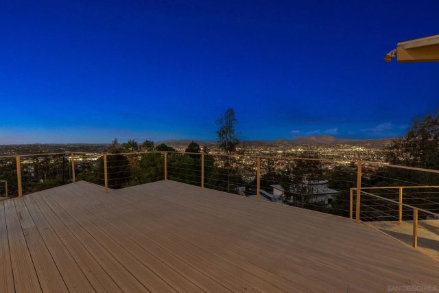a view of an empty room with a large window