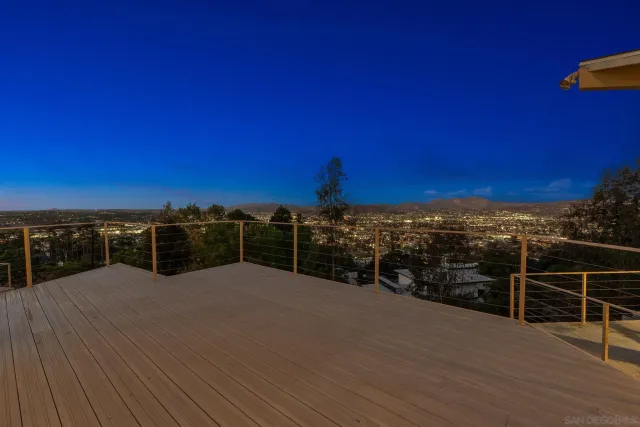 a view of an empty room with a large window