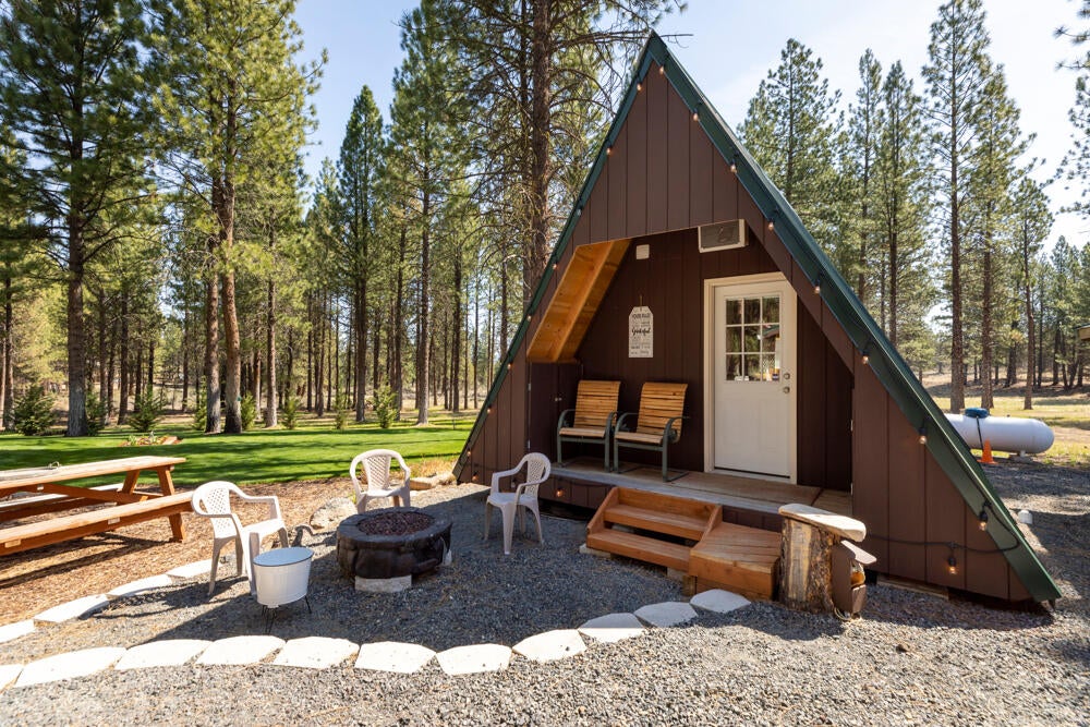 9660 Sprague River Road Chiloquin, OR 97624 - Photo 42 of 58 Propane Firepit, accent lighting w/remote.
