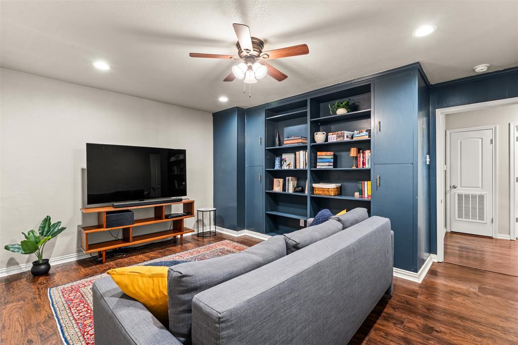 3116 Alexander Avenue Waco, TX 76708 - Photo 28 of 40 a living room with furniture and a flat screen tv