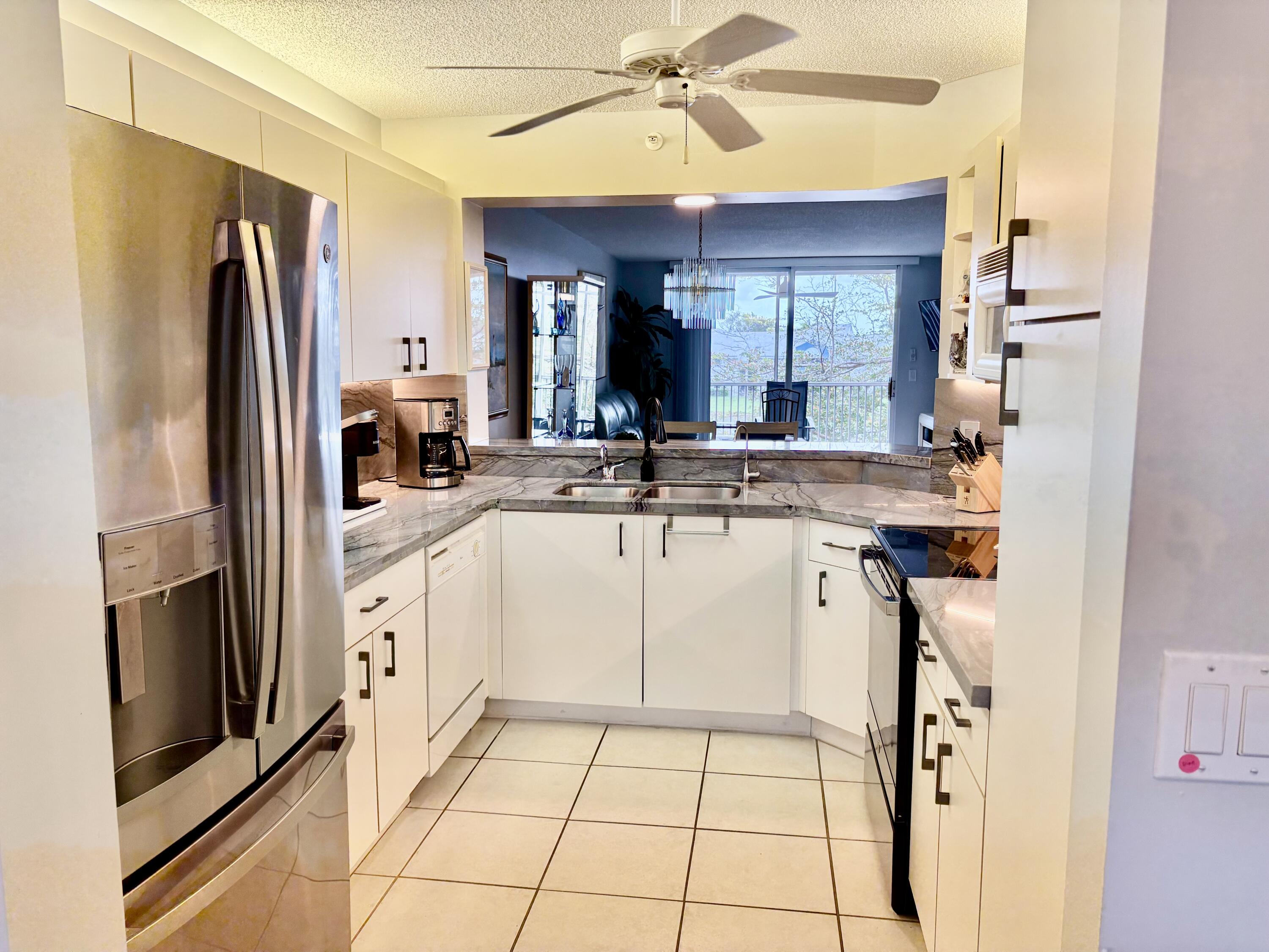 9539 Weldon Circle, Unit F304 Tamarac, FL 33321 - Photo 4 of 27 IMG_3355