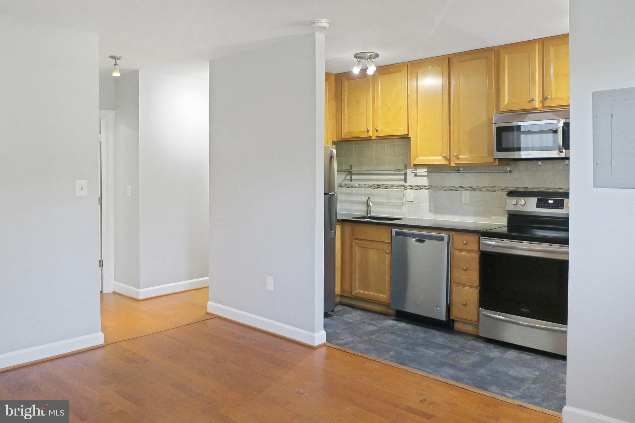 1815 A Street Southeast, Unit 101 Washington, DC 20003 - Photo 12 of 31 Kitchen and Front Hallway