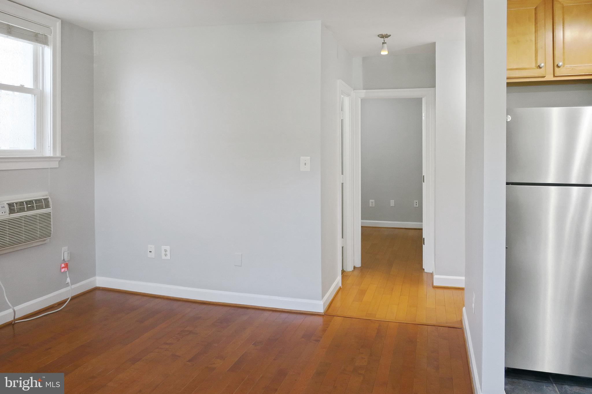 1815 A Street Southeast, Unit 101 Washington, DC 20003 - Photo 16 of 31 Living Room and Front Hallway