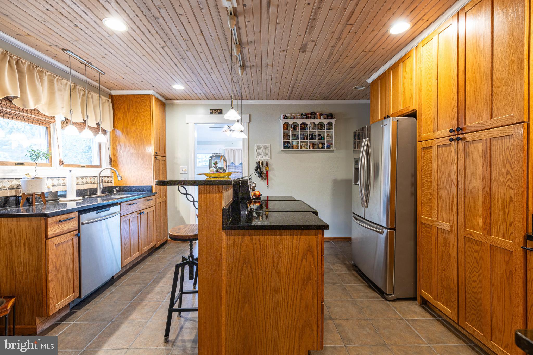 27 Hebb Road Hagerstown, MD 21740 - Photo 12 of 29 Warm and inviting kitchen with rich wood tones.