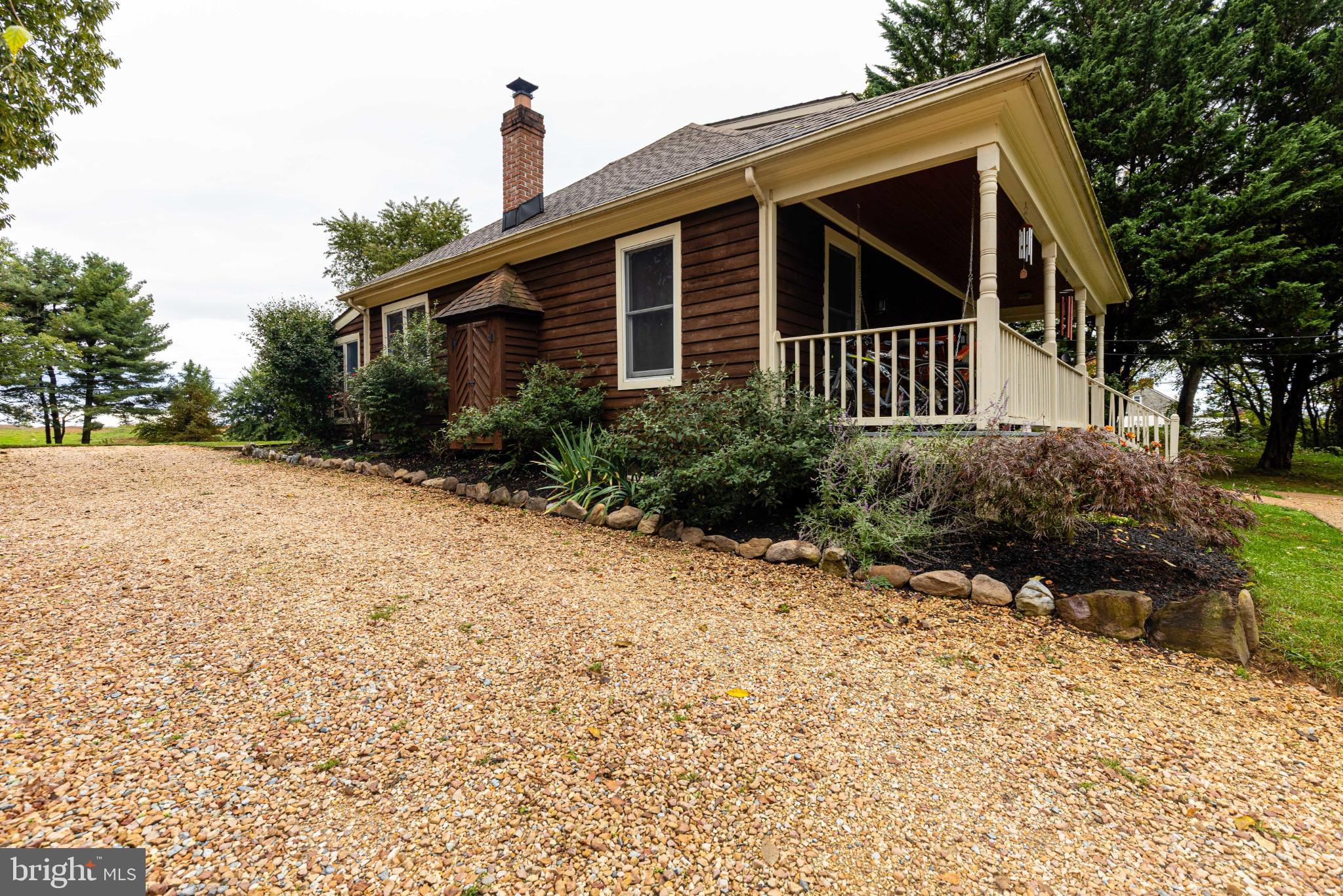 27 Hebb Road Hagerstown, MD 21740 - Photo 6 of 29 Charming home with inviting porch and greenery.