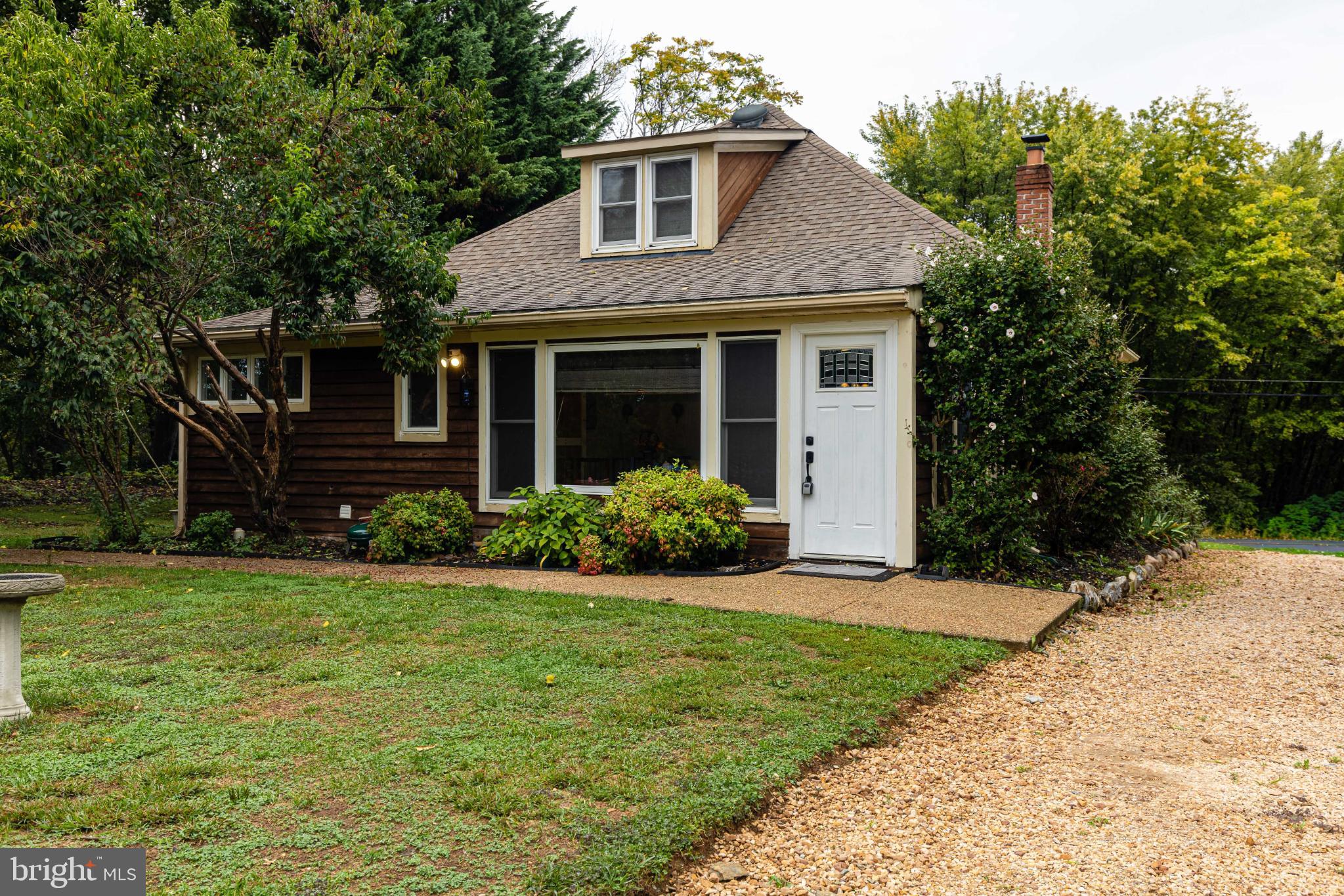 27 Hebb Road Hagerstown, MD 21740 - Photo 7 of 29 Charming cottage nestled in lush greenery.