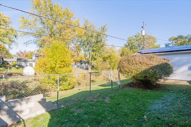 a garden view with a fountain