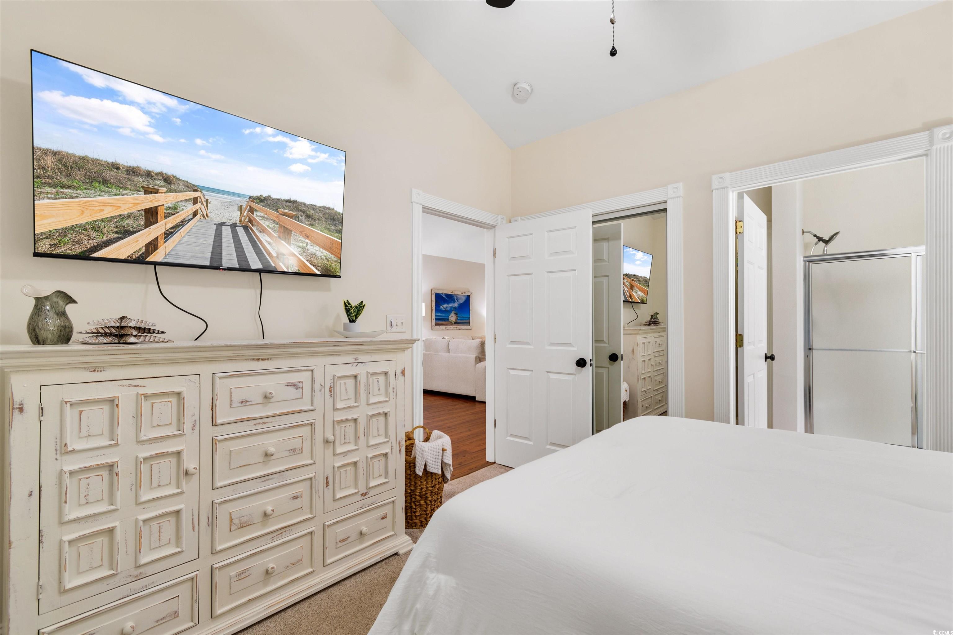 4843 Luster Leaf Circle, Unit 402 Myrtle Beach, SC 29577 - Photo 19 of 33 Bedroom featuring vaulted ceiling