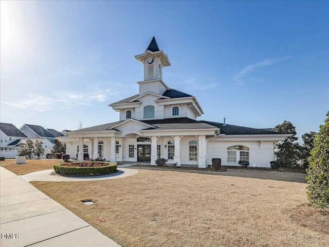 a front view of a building with street view