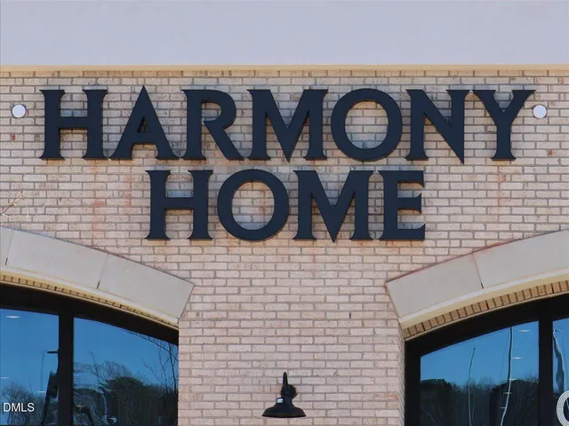 a view of a brick wall and an outdoor space