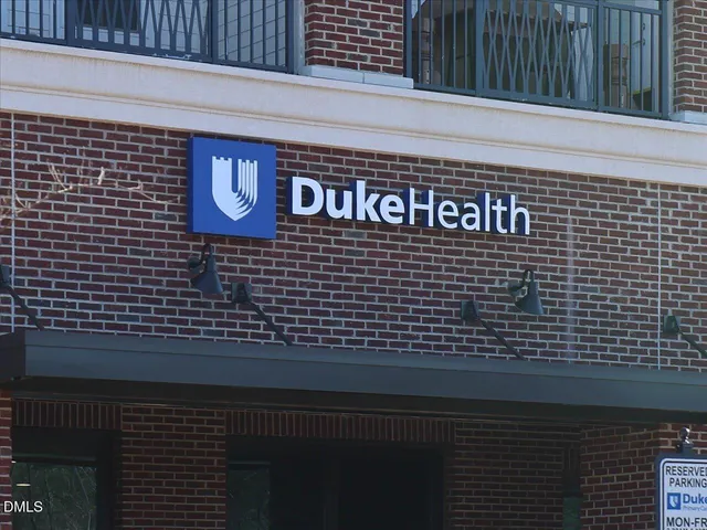 a picture of a bathroom with a shower