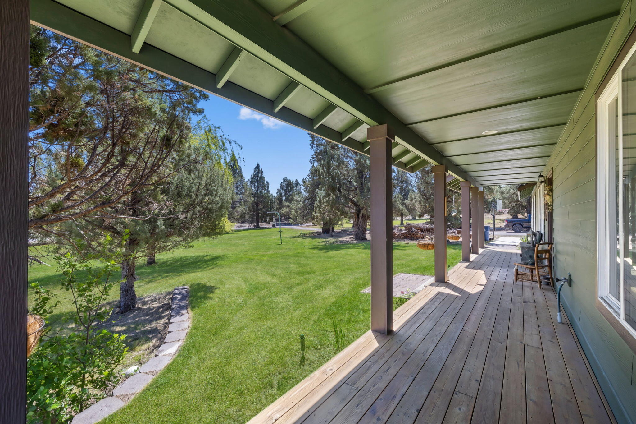 63639 Gentry Loop Bend, OR 97701 - Photo 31 of 40 a view of a porch with wooden floor