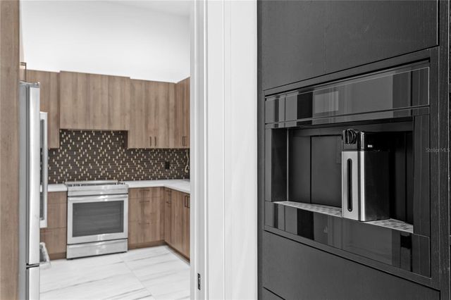 a view of an empty room with a balcony