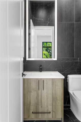 a bedroom with a bed and a closet