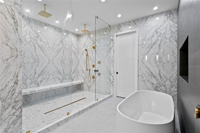 a bathroom with a sink a toilet and a bathtub