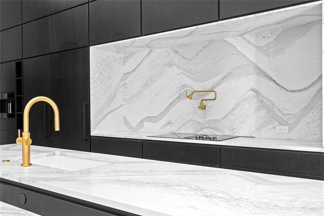 a view of a kitchen from the hallway