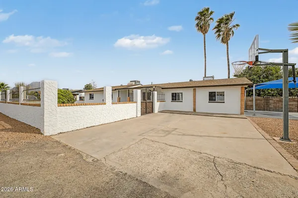 a house view with a garden space