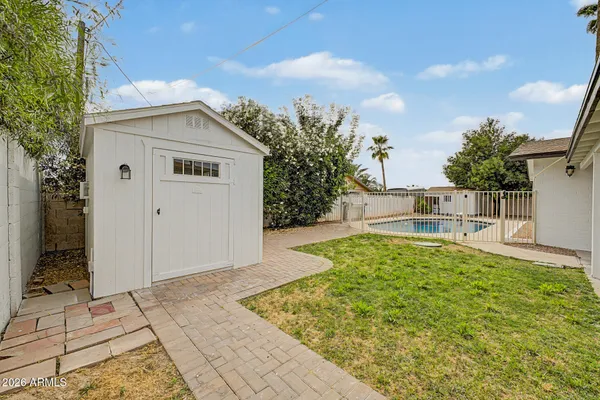 a view of a house with swimming pool