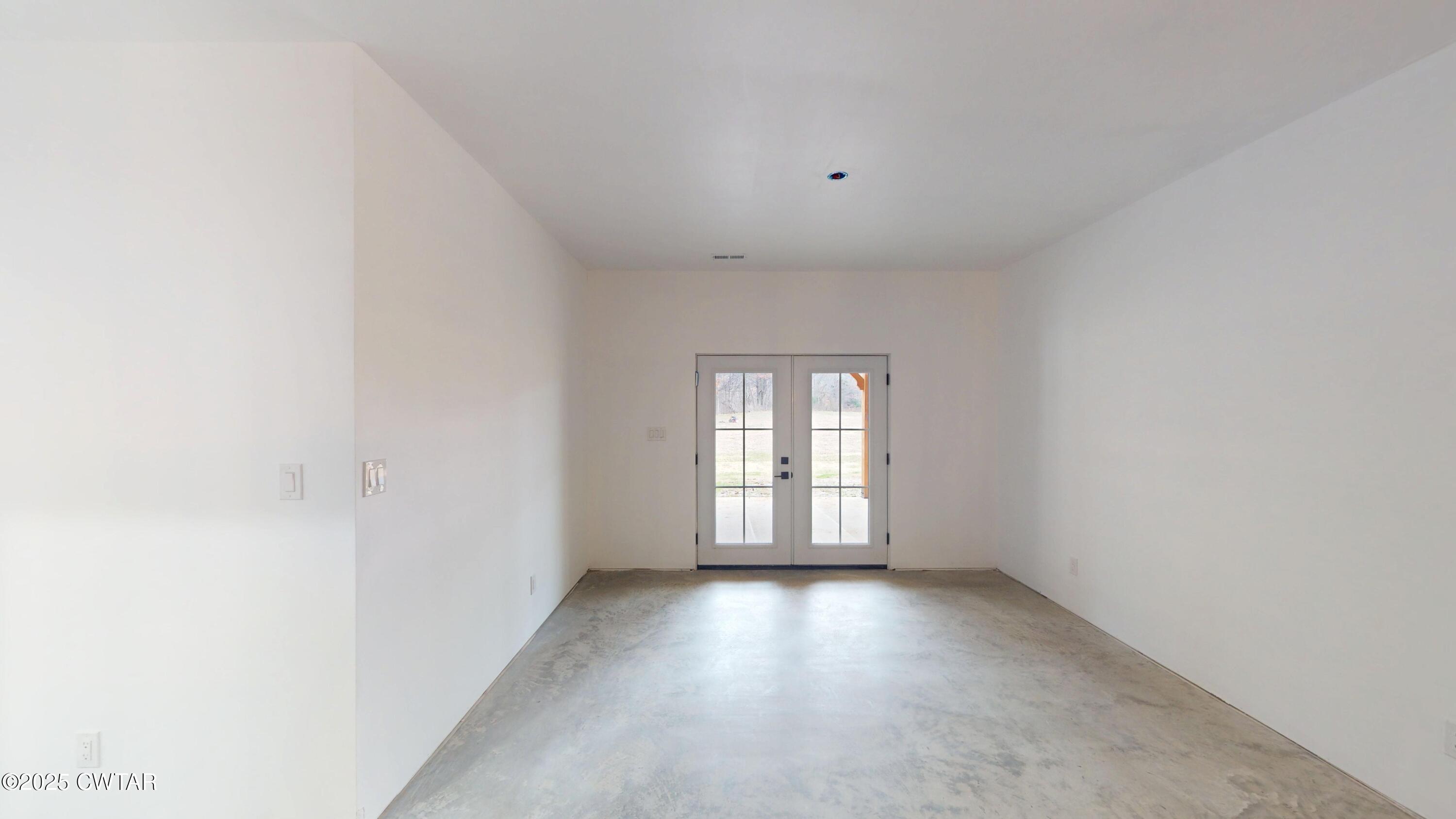 3140 Rowland Mill Road Buena Vista, TN 38318 - Photo 13 of 34 a view of empty room with a window
