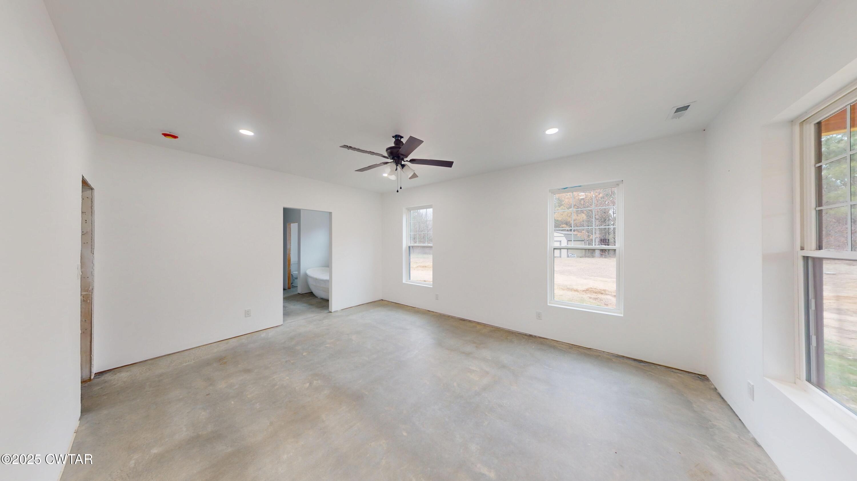 3140 Rowland Mill Road Buena Vista, TN 38318 - Photo 14 of 34 a view of an empty room with a window