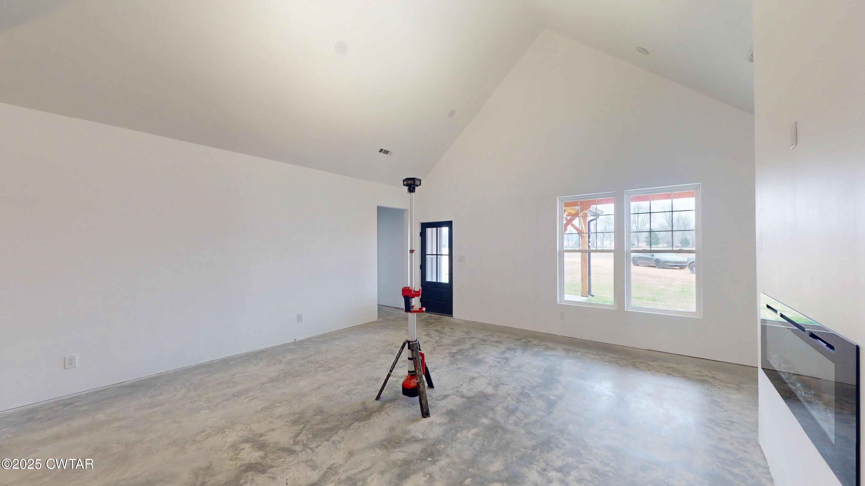 3140 Rowland Mill Road Buena Vista, TN 38318 - Photo 4 of 34 an empty room with windows