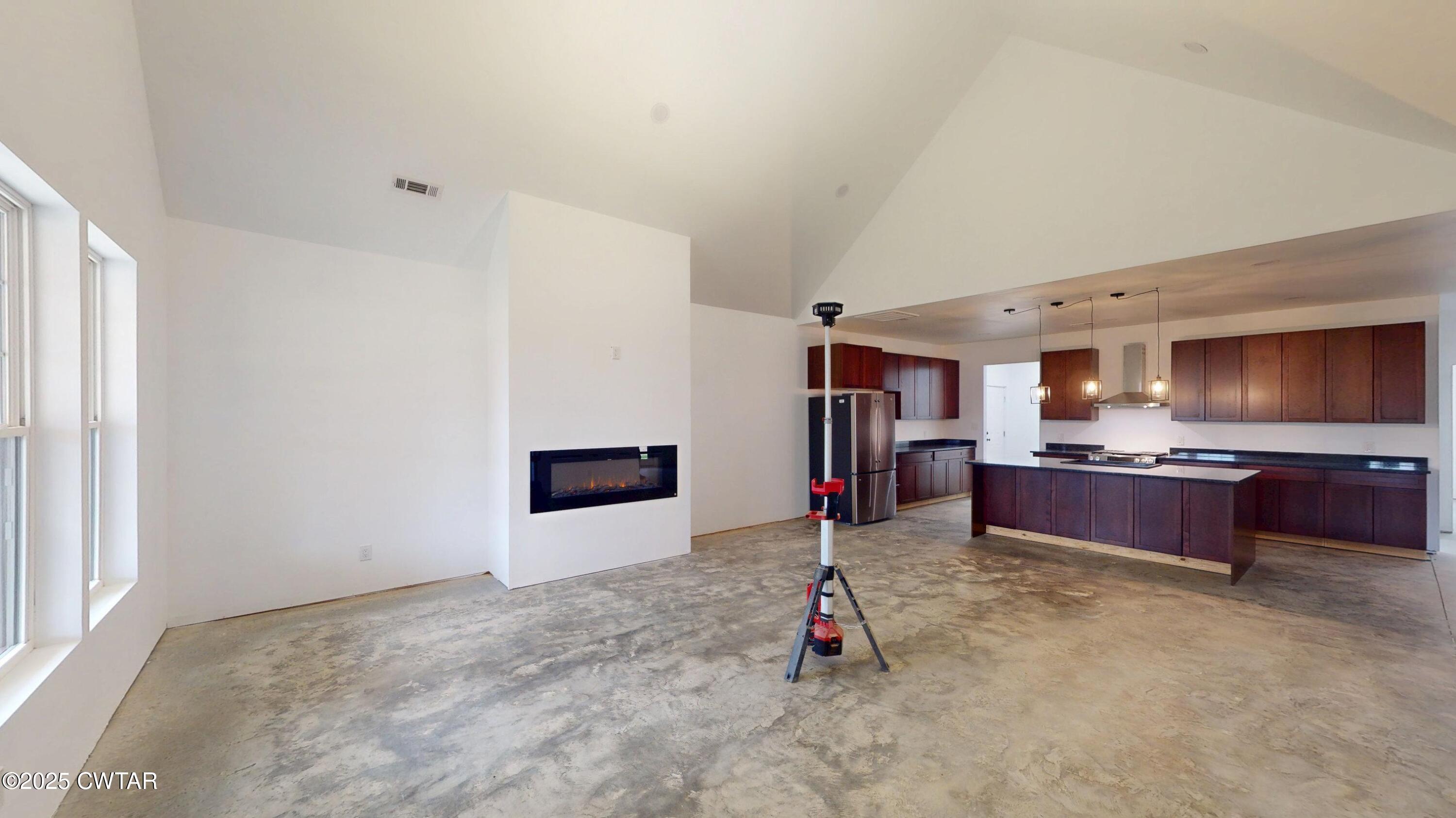 3140 Rowland Mill Road Buena Vista, TN 38318 - Photo 6 of 34 a living room with furniture and a flat screen tv
