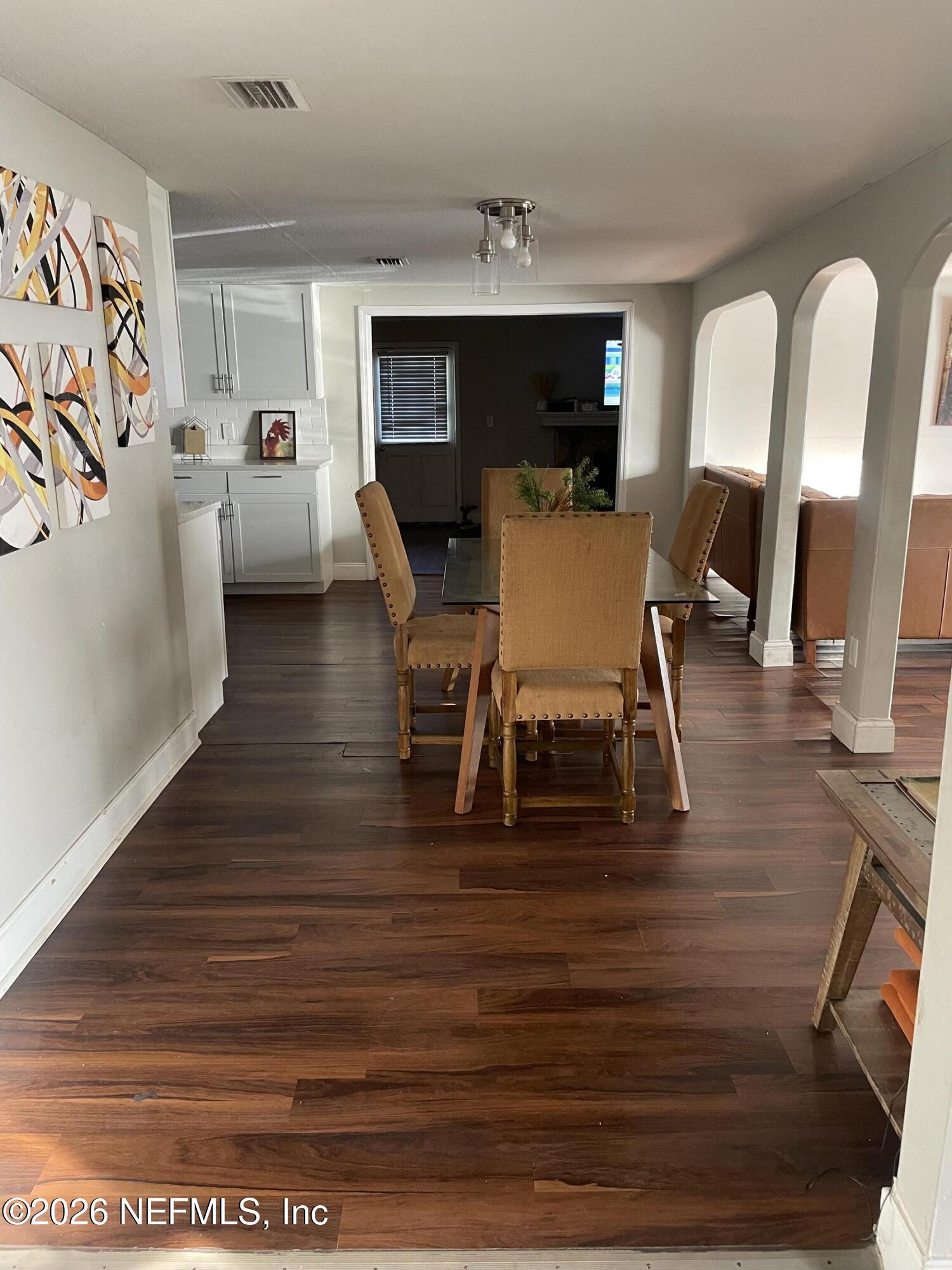 5884 Retha Road Jacksonville, FL 32254 - Photo 6 of 16 a living room with furniture and a table