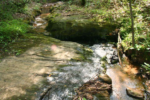 Waters slide between the rocks