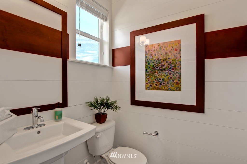 3532 178th Street Southeast, Unit 1002 Bothell, WA 98012 - Photo 8 of 25 a bathroom with a toilet sink and mirror