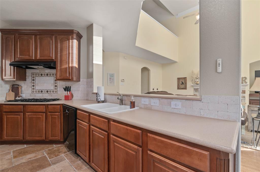 1100 Durango Circle Shady Shores, TX 76208 - Photo 14 of 39 a kitchen with a sink cabinets and window