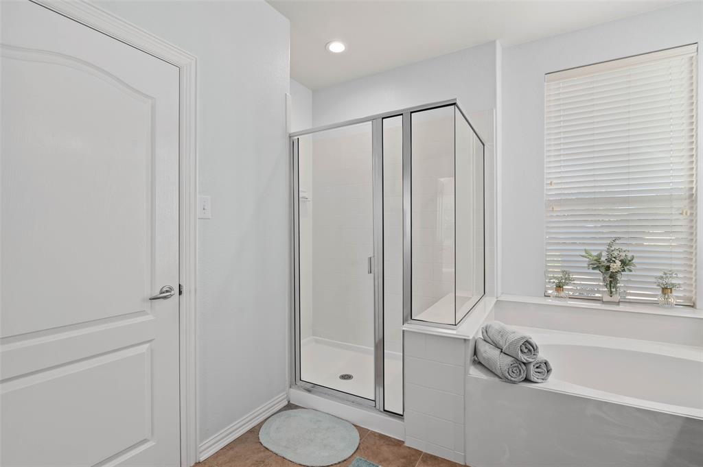 1100 Durango Circle Shady Shores, TX 76208 - Photo 18 of 39 a bathroom with a granite countertop sink toilet and shower