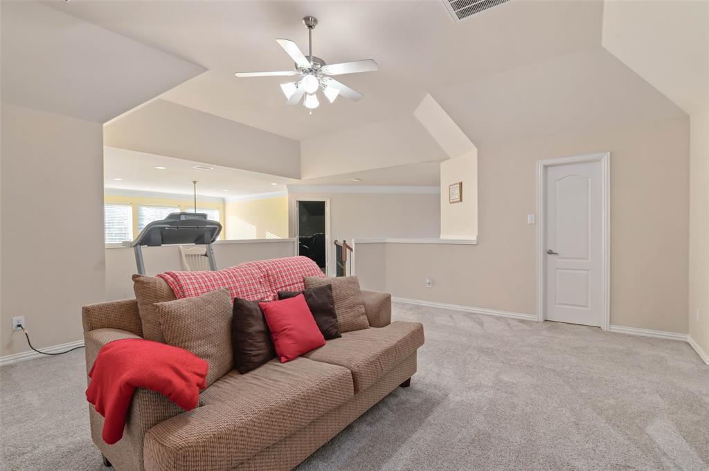 1100 Durango Circle Shady Shores, TX 76208 - Photo 23 of 39 a living room with furniture and a chandelier