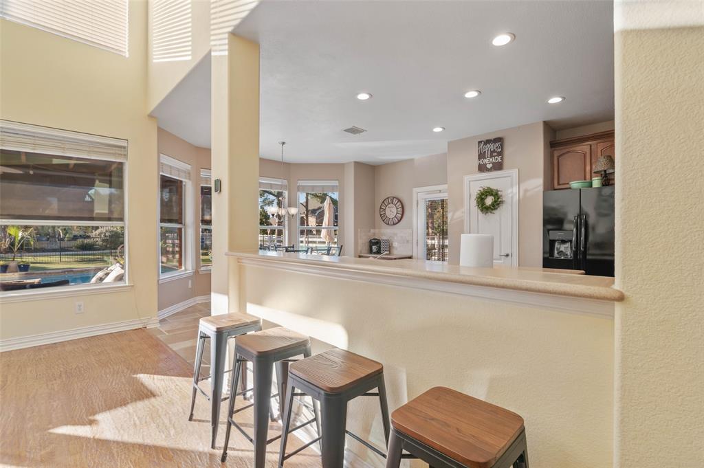 1100 Durango Circle Shady Shores, TX 76208 - Photo 10 of 39 a living room with furniture and a large window