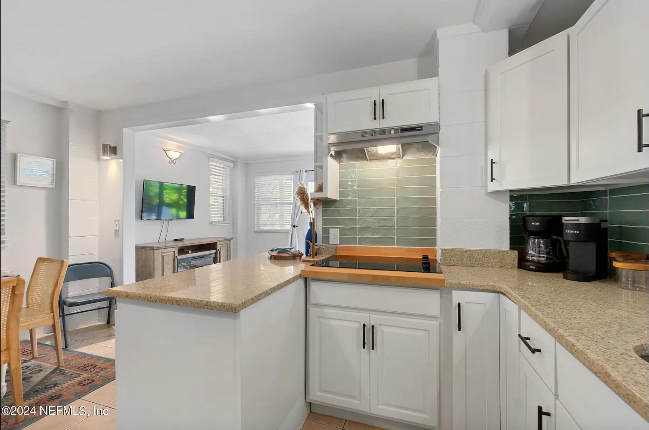 152 Manresa Road St. Augustine, FL 32084 - Photo 30 of 42 KITCHEN:LIVING DOWN