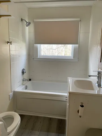 a bathroom with a sink and a bathtub