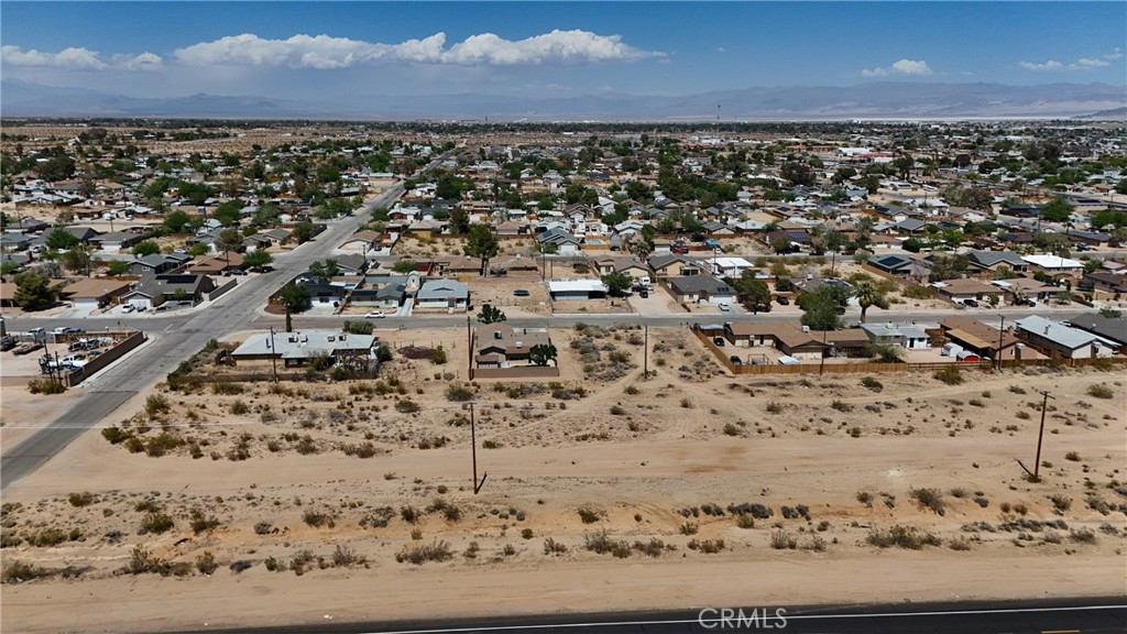 744 West Bowman (near) Road Ridgecrest, CA 93555 - Photo 5 of 9 Red boundary lines on pictures are an estimate and for marketing purposes only. Buyer to verify all aspects of this property including, but not limited to utilities, assessments, boundaries, usage, access, and zoning to satisfy themselves.