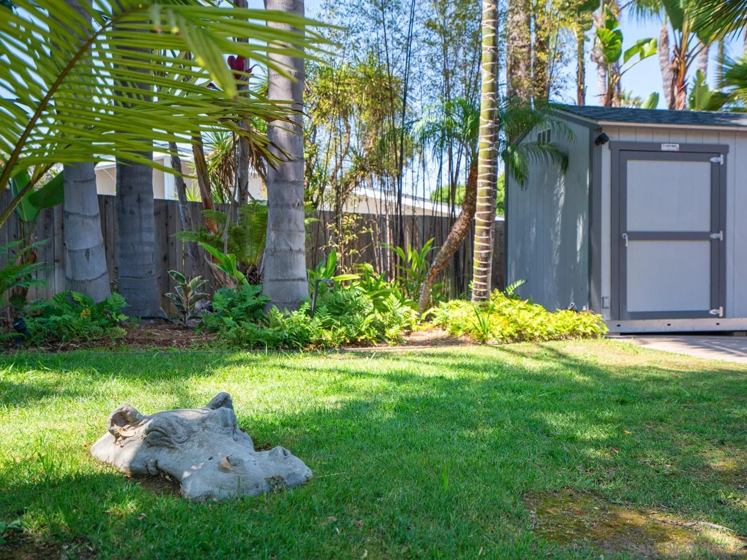 2043 Janet Circle Oceanside, CA 92054 - Photo 20 of 27 a garden with trees in front of it