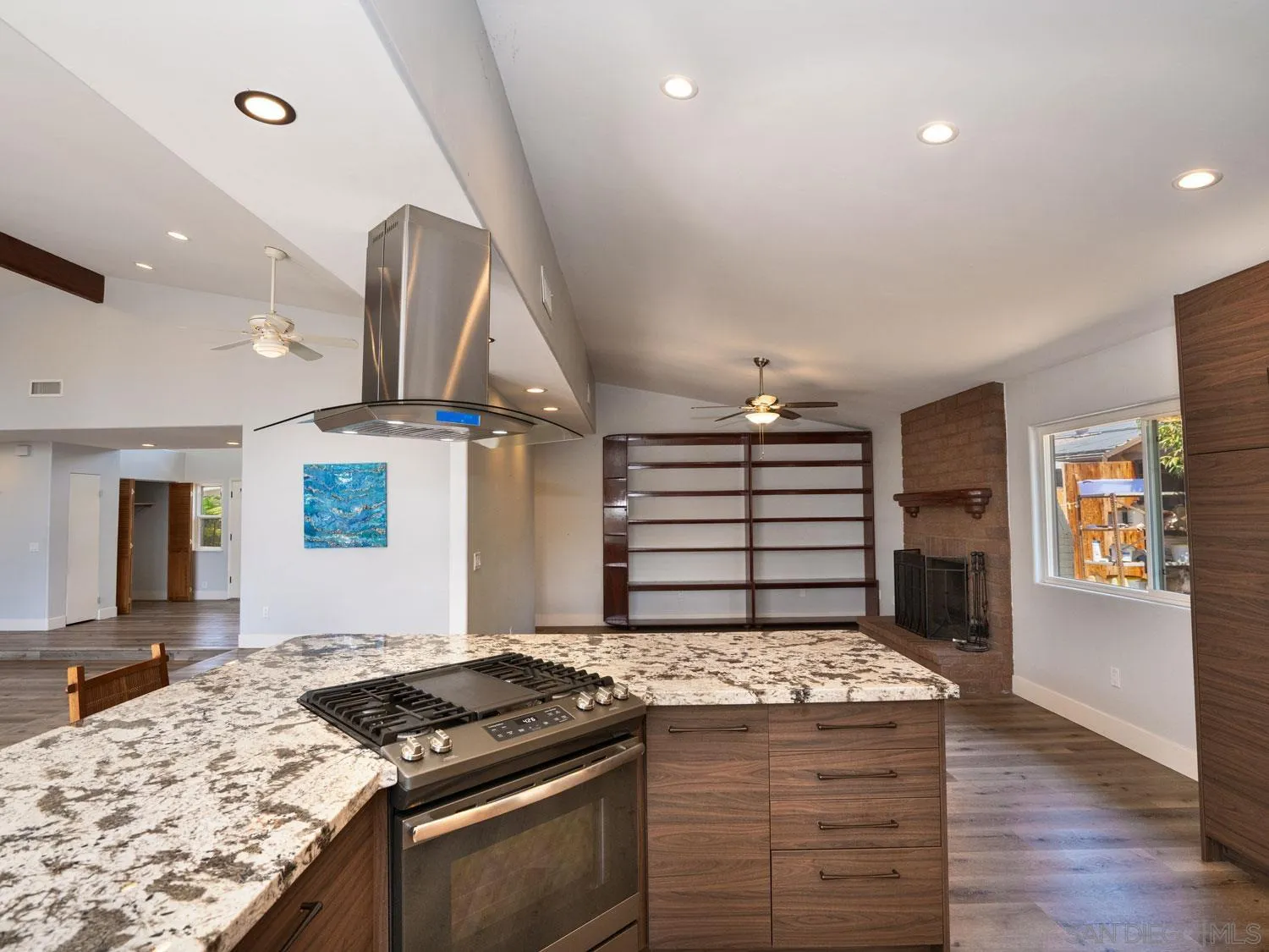 2043 Janet Circle Oceanside, CA 92054 - Photo 9 of 27 a kitchen with a stove and a wooden floor